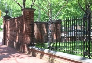 Fences and walls designed and built 1975 for Independence National Historical Park at 5th and Walnut Streets. This iron work by Crescent Ironworks.