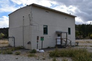 Slotin Building Simple small tan two story building – three stairs lead to a small covered entrance.