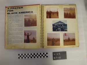 Open photo album with article title reads A prayer for Black America and additional seven photos of black soldiers.