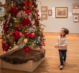 FloGrisTree-300x278 A boy looks at one of the palette trees