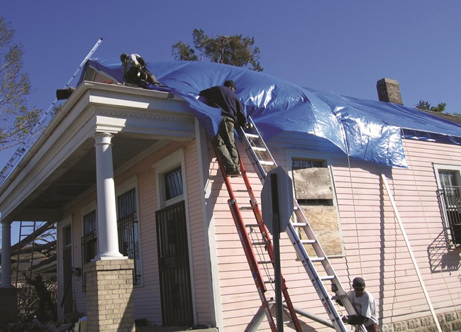 The NCPTT-supported Tarps New Orleans initiative protected dozens of historic homes ineligible for help from FEMA. The program demonstrates that high standards for methods, materials, safety and preservation can be achieved even in the face of widespread