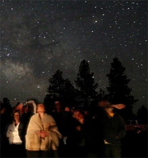 Park visitors participate in a ranger's green laser tour at the Bryce Canyon Astronomy Festival, Utah.
