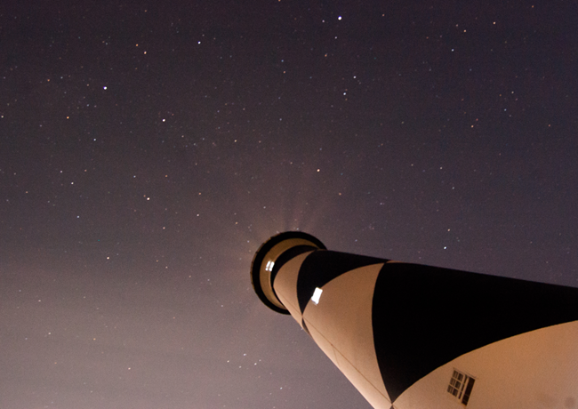 stars above cape lookout lighthouse The starry night sky above the Cape Lookout Lighthouse