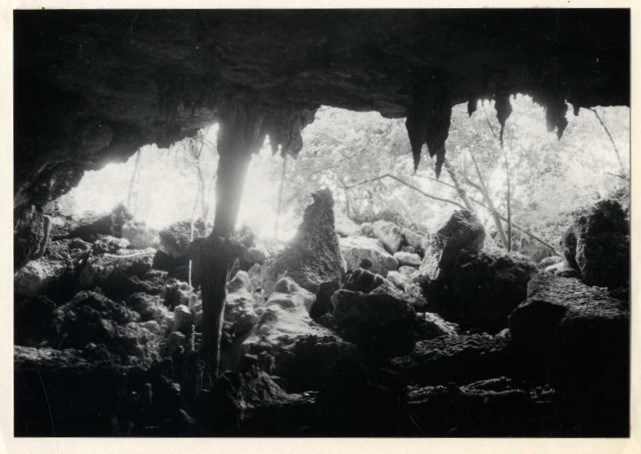 Black and white image of cave entrance