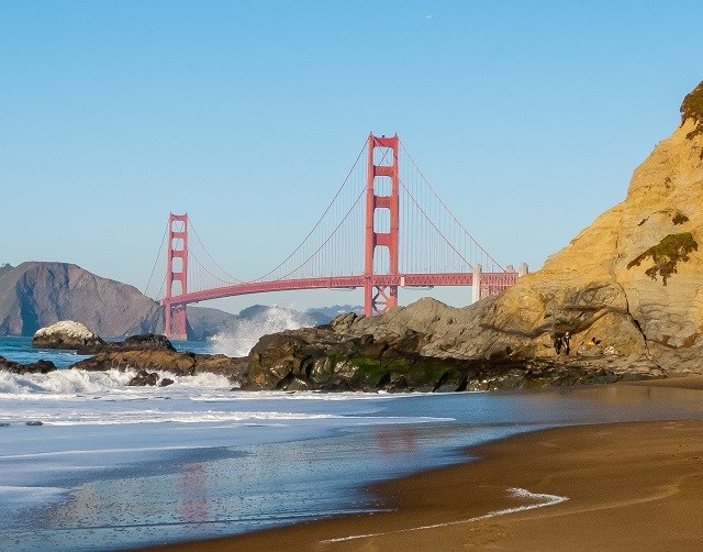 GOGA Bridge NPS Kirk Wrench Long red bridge going cliff to cliff over a bay