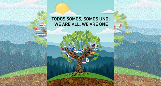 Illustrated poster of a tree decorated with flags of many Latin American countries on top of a hill. Text reads "Todos Somos, Somos Uno: We Are All, We Are One"