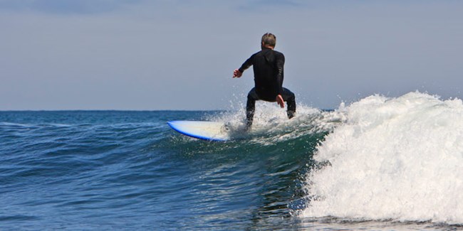 Surfer on wave.