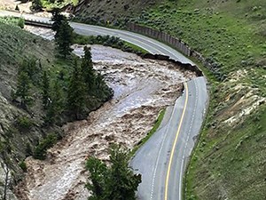 Flood-damaged section of North Entrance Road in Yellowstone National Park Flood-damaged section of North Entrance Road in Yellowstone National Park
