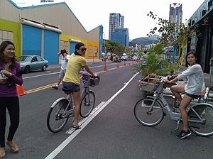 lt= Bicyclists explore city streets closed off to traffic during a day long event.