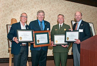 Yosemite Conservany Members receiving the Director's Partnership Award from Director Jon Jarvis