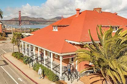 William Penn Mott Jr. Visitor Center William Penn Mott Jr. Presidio Visitor Center with a backdrop of San Francisco Bay, the Marine Headlands and Golden Gate Bridge