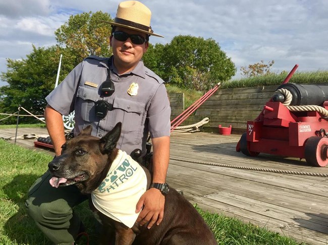 FOMC_PawPatrol A park ranger and his dog ambassador.