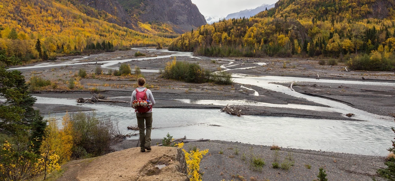 View of Eagle River valley. woman looking out over a lattice of streams
