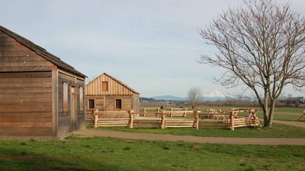 Historic wood-framed buildings and fence. Historic wood-framed buildings and fence.