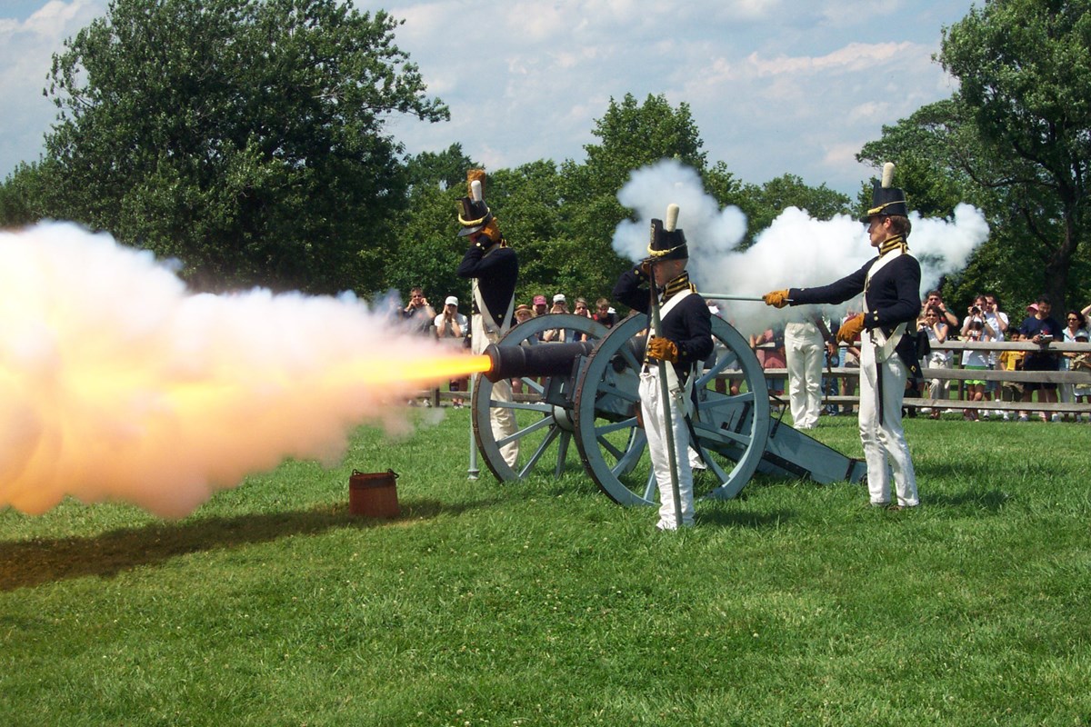 Guards fire the cannon during a historical battle re-enactment at Fort McHenry National Monument and Historic Shrine, Maryland.