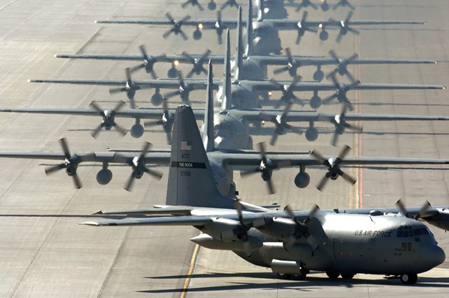 U.S. Air Force planes taxi on the runway at Nellis Air Force Base