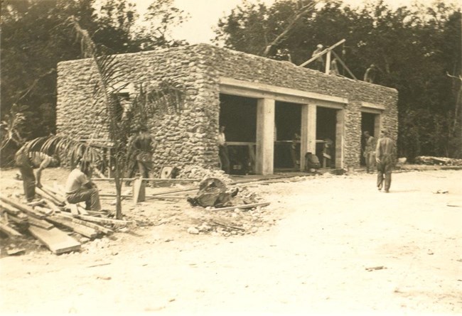 EVER 307214 Civilian Conservation Corps workers constructing a maintenance building in the Everglades