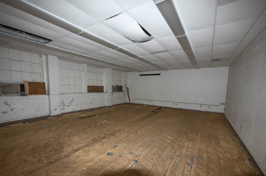 acoustical panel ceilings obsuring parts of historic window