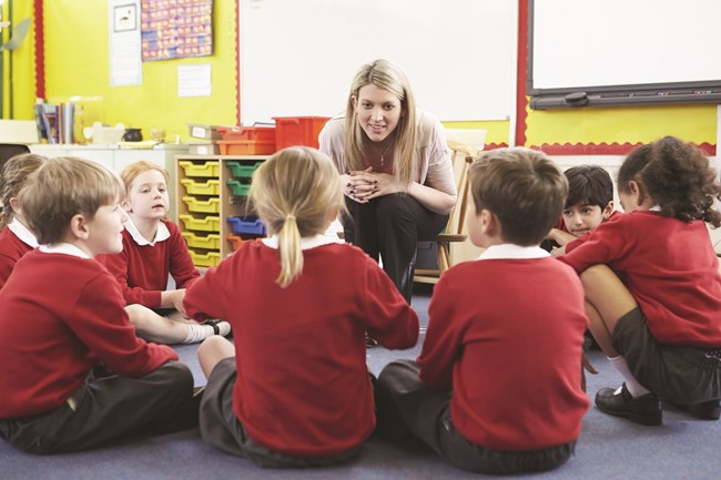 Teacher and students. Teacher and students.