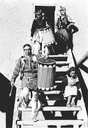lt= “Dance, San Ildefonso Pueblo, New Mexico, 1942.”
