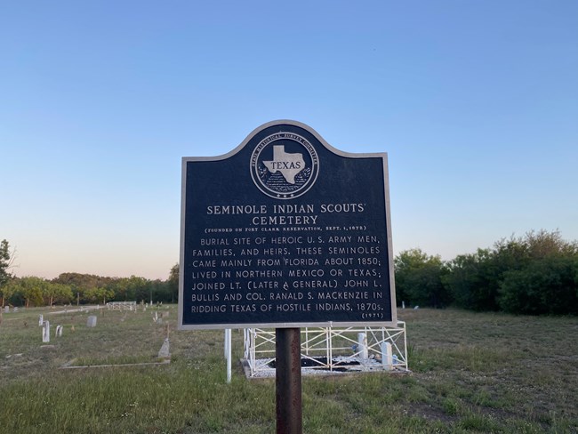Sign inside cemetery reads "Seminole Indian Scouts Cemetery...Burial Site of heroic U.S. Army Men, families, and heirs. These Seminoles came mainly from Florida about 1850, lived in Northern Mexico or Texas...ridding Texas of Hostile Indians.