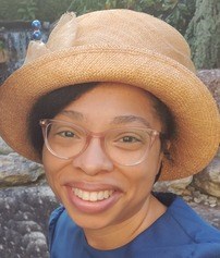 Kelli Barnes edited picture black woman with glasses and hat