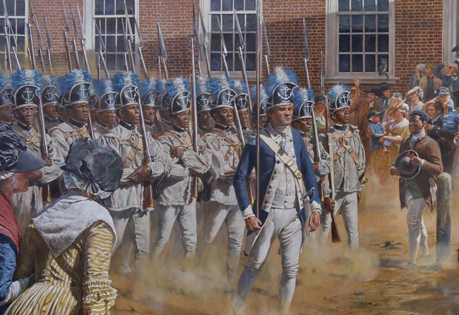 African American soldiers in the Revolutionary War marching down a dusty road with rifles