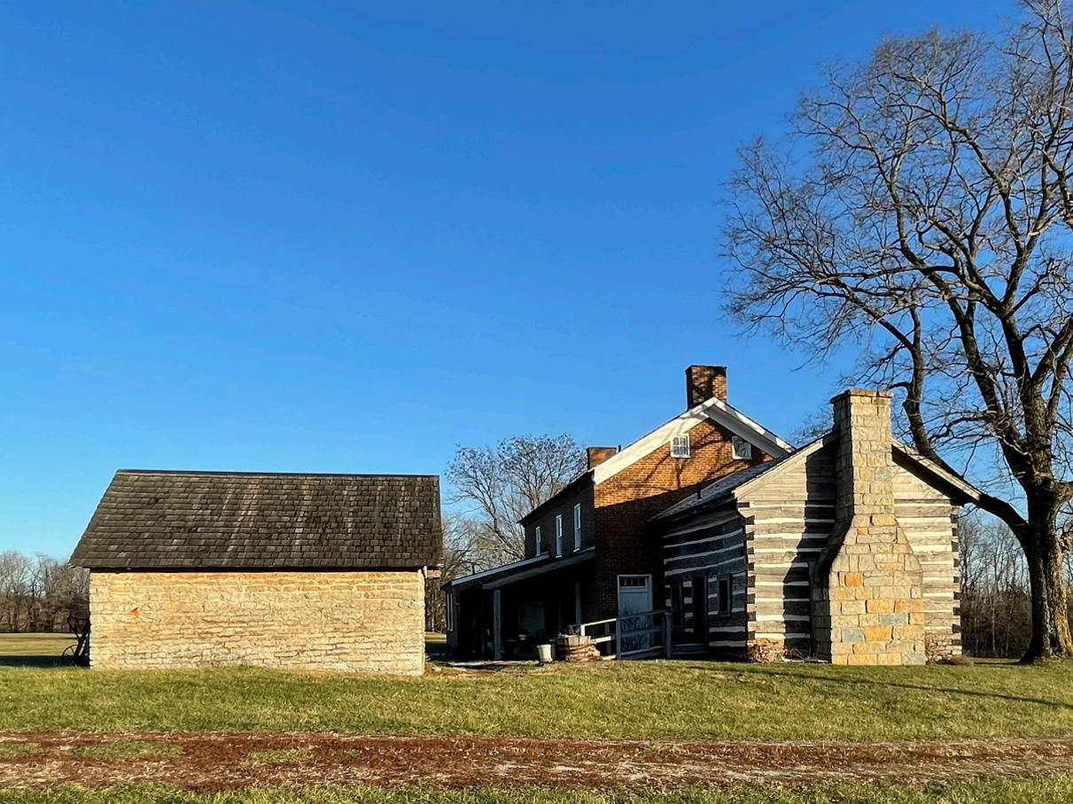 The John T. Wilson Homestead House in field