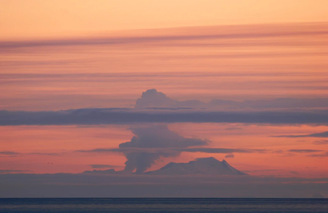 KATM fourpeaked volcano eruption photo by Lanny Simpson Alaska High Mountain Images distant view of erupting volcano