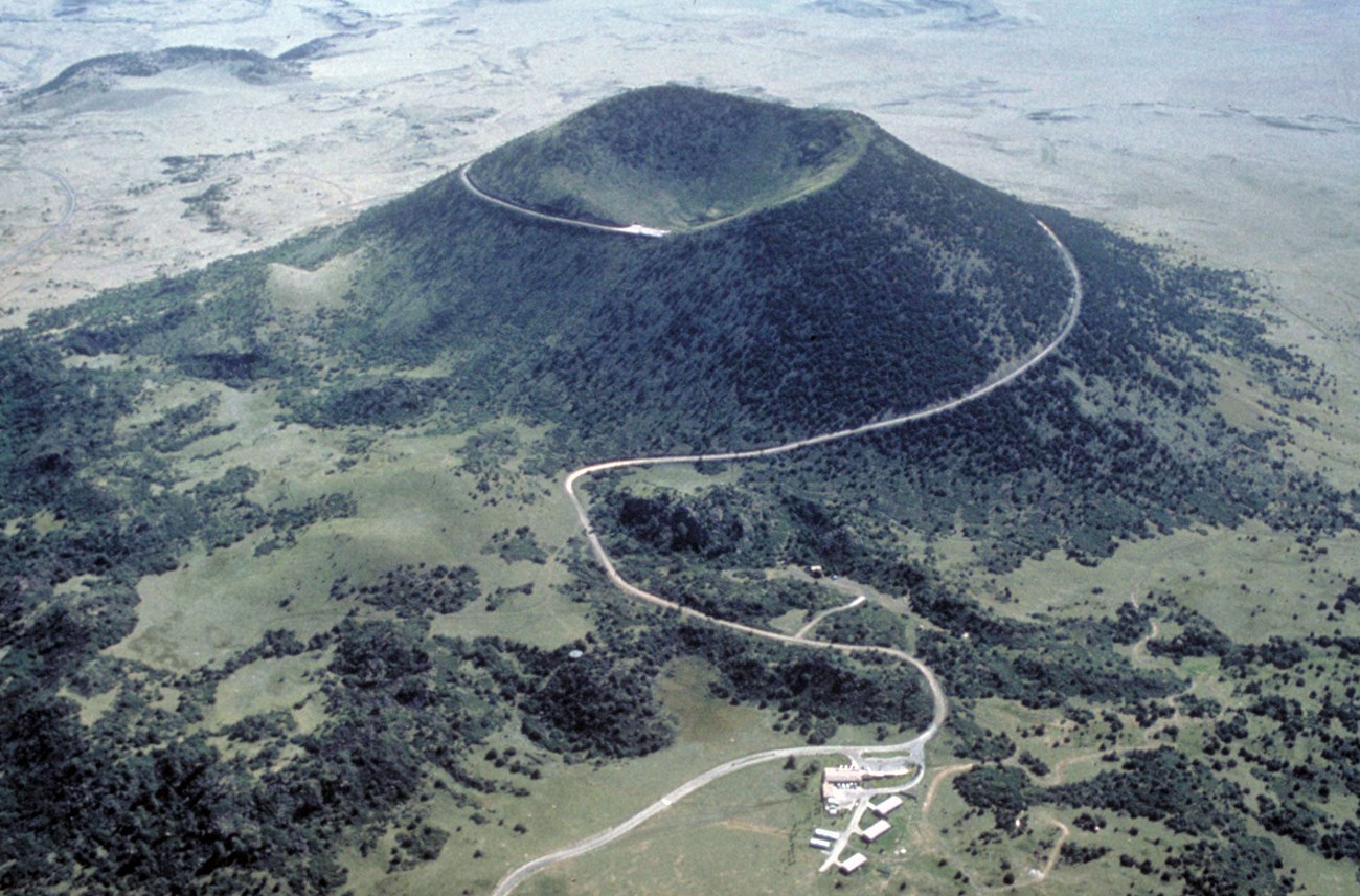 aerial view of a cinder cone and volcanic landscape