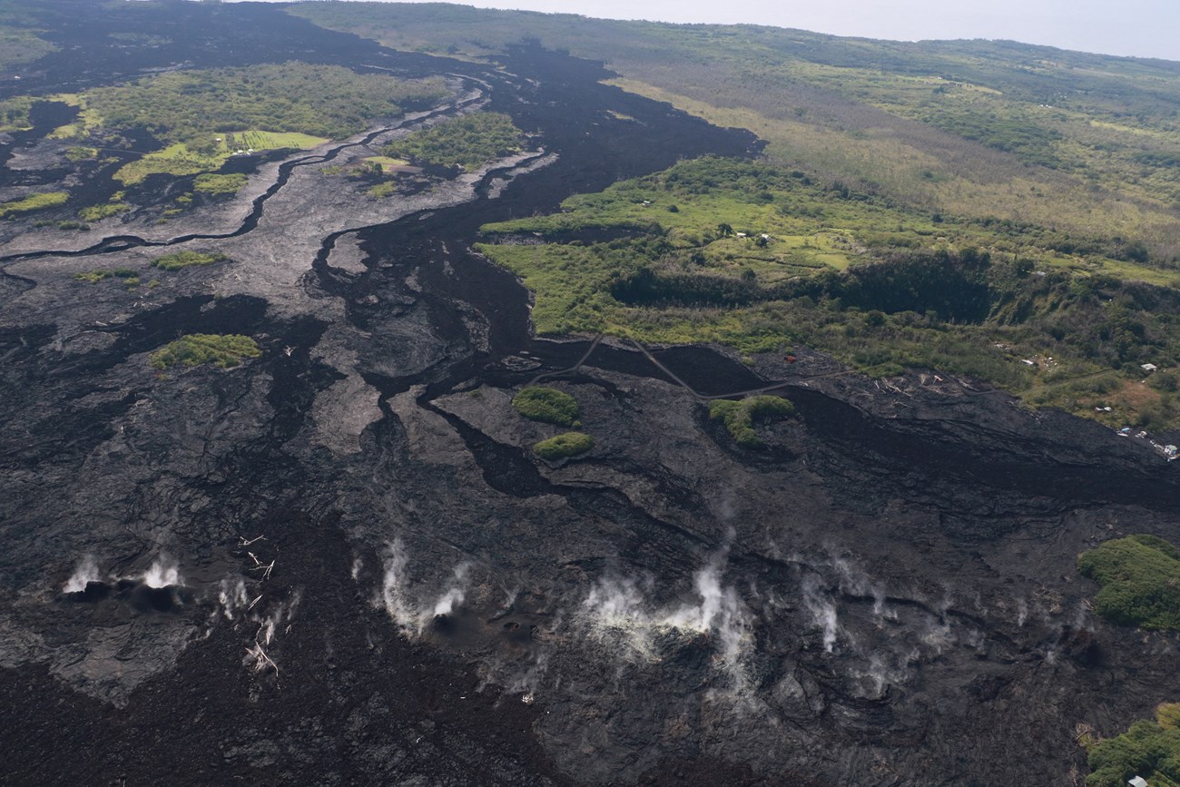 Aerial photo of a hillslope covered by a lava flow.