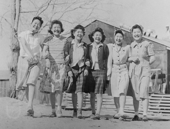 Enjoying an afternoon stroll at this War Relocation Center for evacuees of Japanese ancestry.Courtesy NPS.