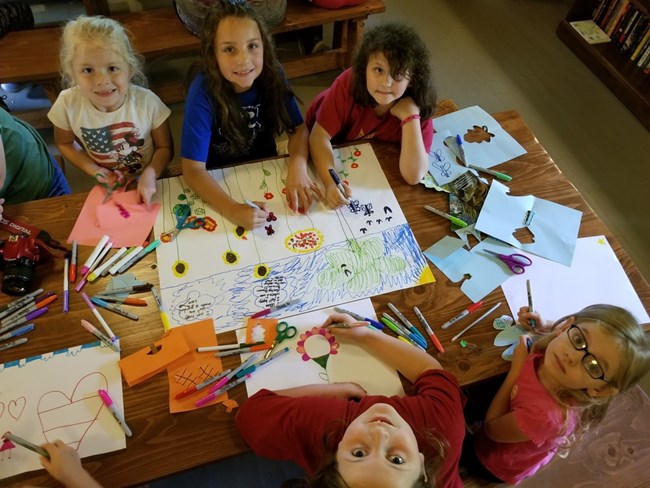 Girl Scout Ranger Weekend at Camp Brookside Girl Scouts creating artwork.