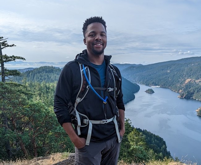 Jay Fennell posing outdoors while on a hike