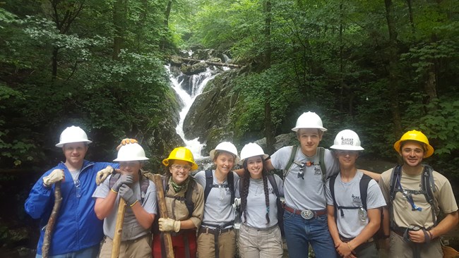 lt= Youth Corps takes a break from clearing trails
