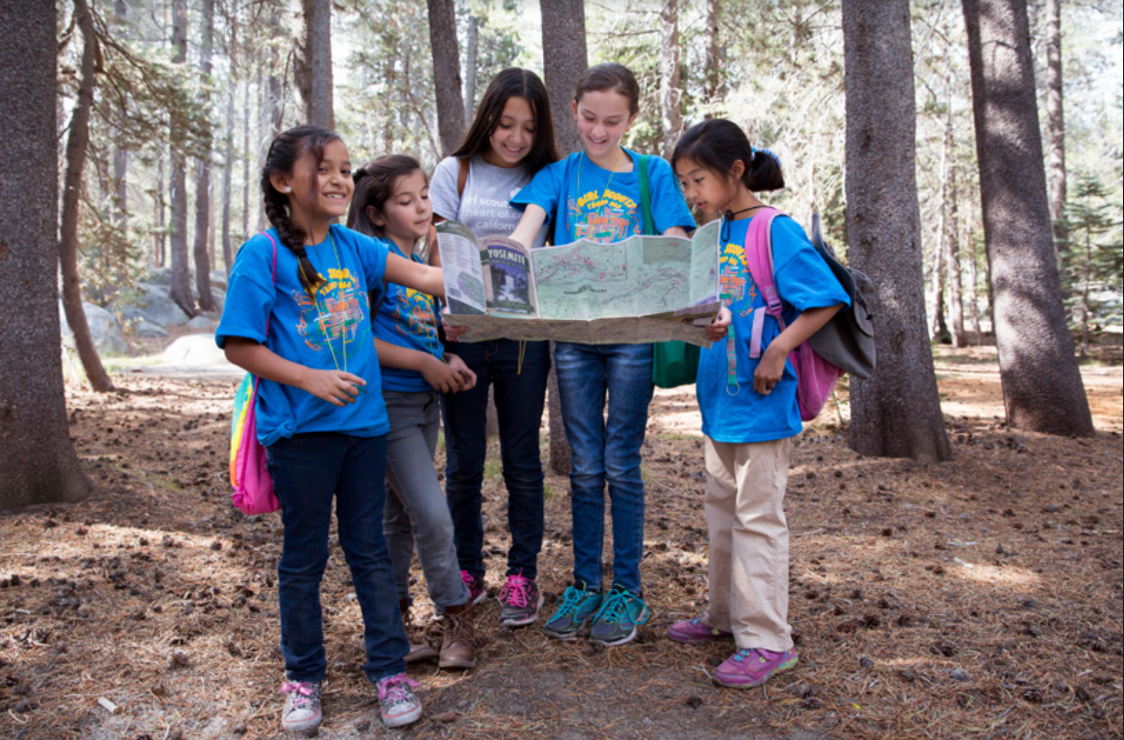 Girl Scouts read map.