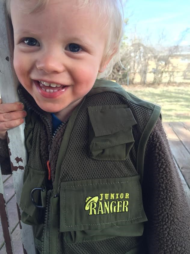 Junior Ranger smiles.