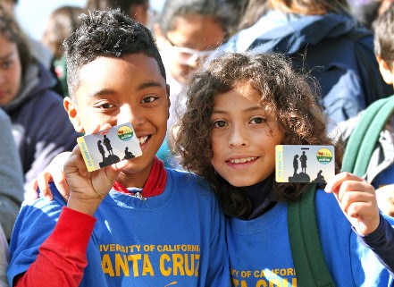 4th graders pose with a Every Kid Outdoor pass.