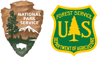 the National Park Service Arrowhead and U.S. Forest Service Shield logos