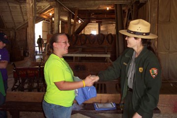 student receiving award in contest