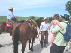 Cowboys Caleb and Josh greet visitors at the preserve