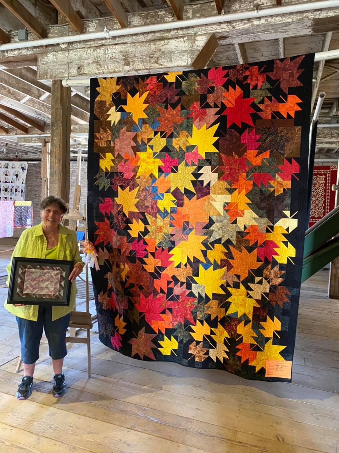 Winning quilt is COVID Mapleleaf by Kathy Law