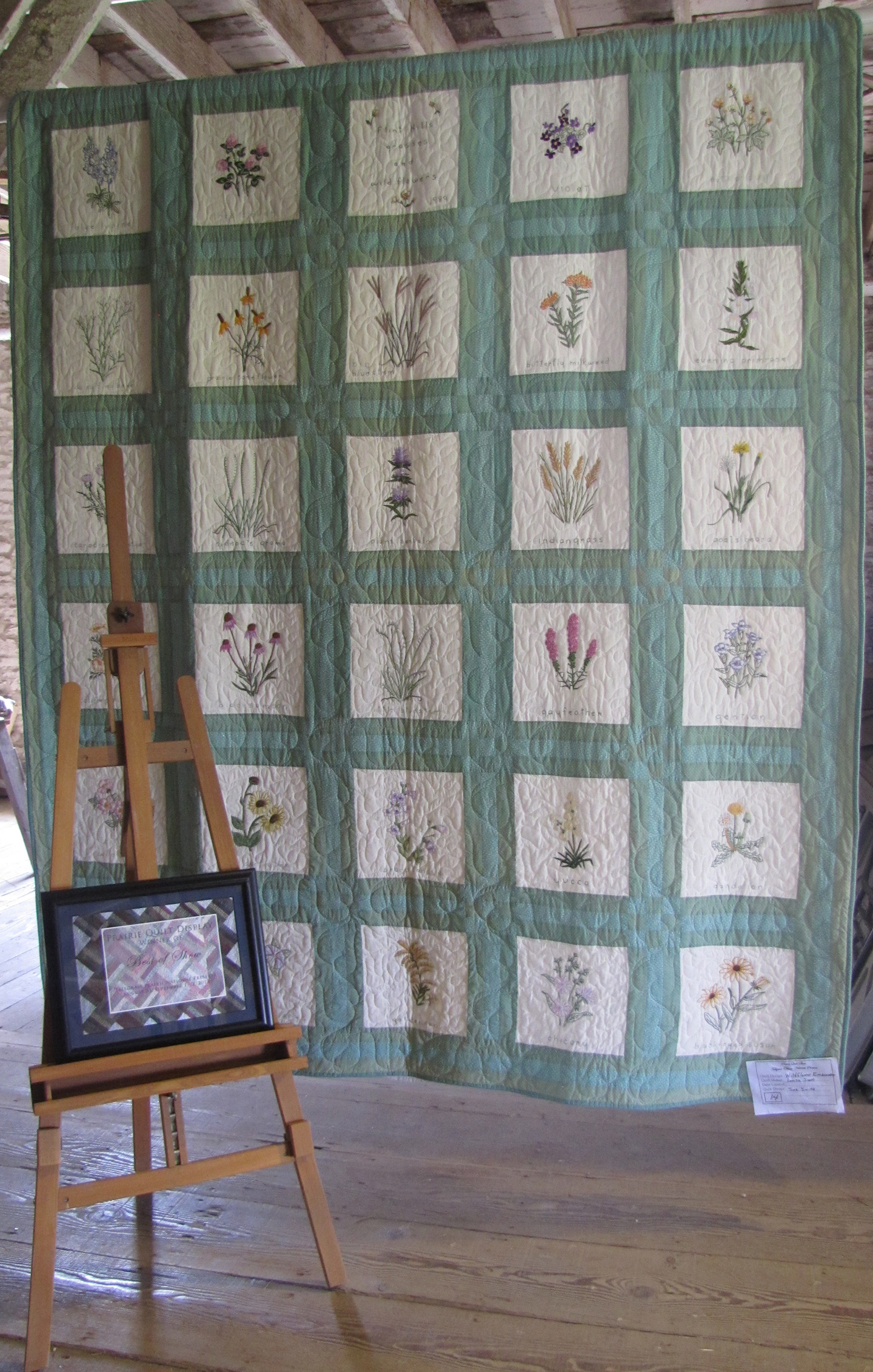 Winning quilt for 2019 Winning entry of the 2019 Quilt Display is an embroidered wildflower quilt made by local resident Louise Scott.