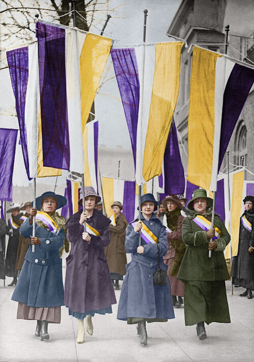 Women-Suffrage-Picket-Parade-colorized Four women carrying colorful suffrage banners