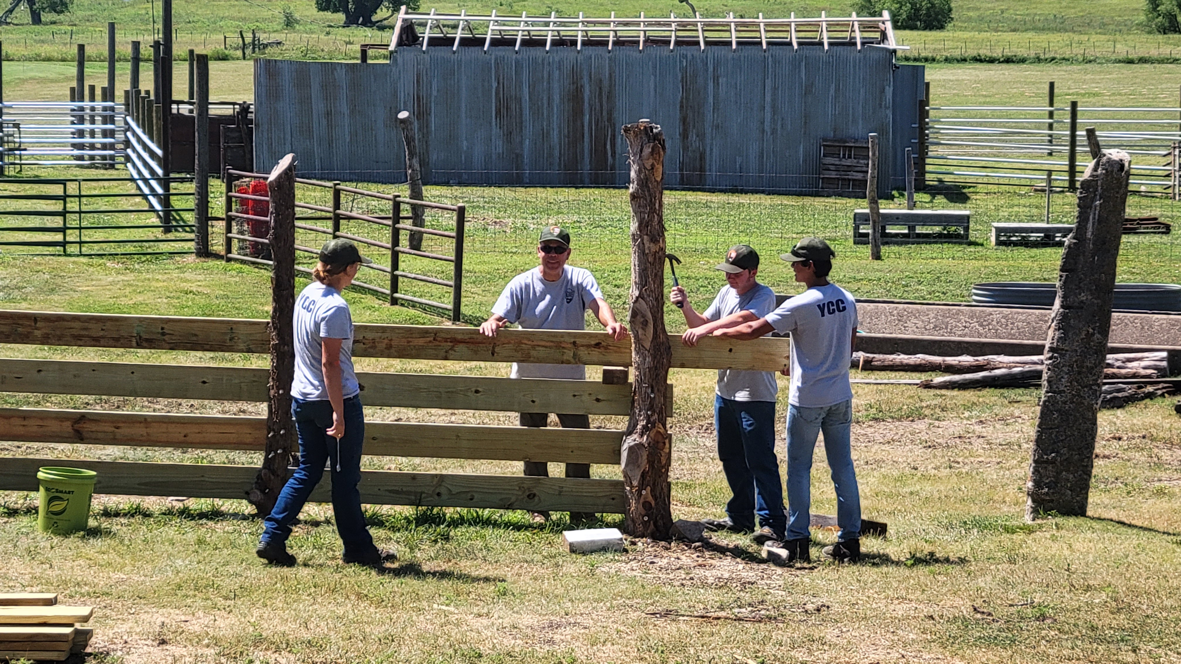 YCC kids working on corral YCC kids working on corral