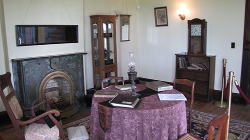 Interior of the south parlor with period appropriate furniture for the 1880s.