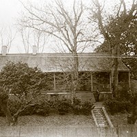 The Gardens single story house with porch across the front