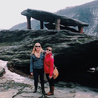 Visitors standing near Jefferson Rock