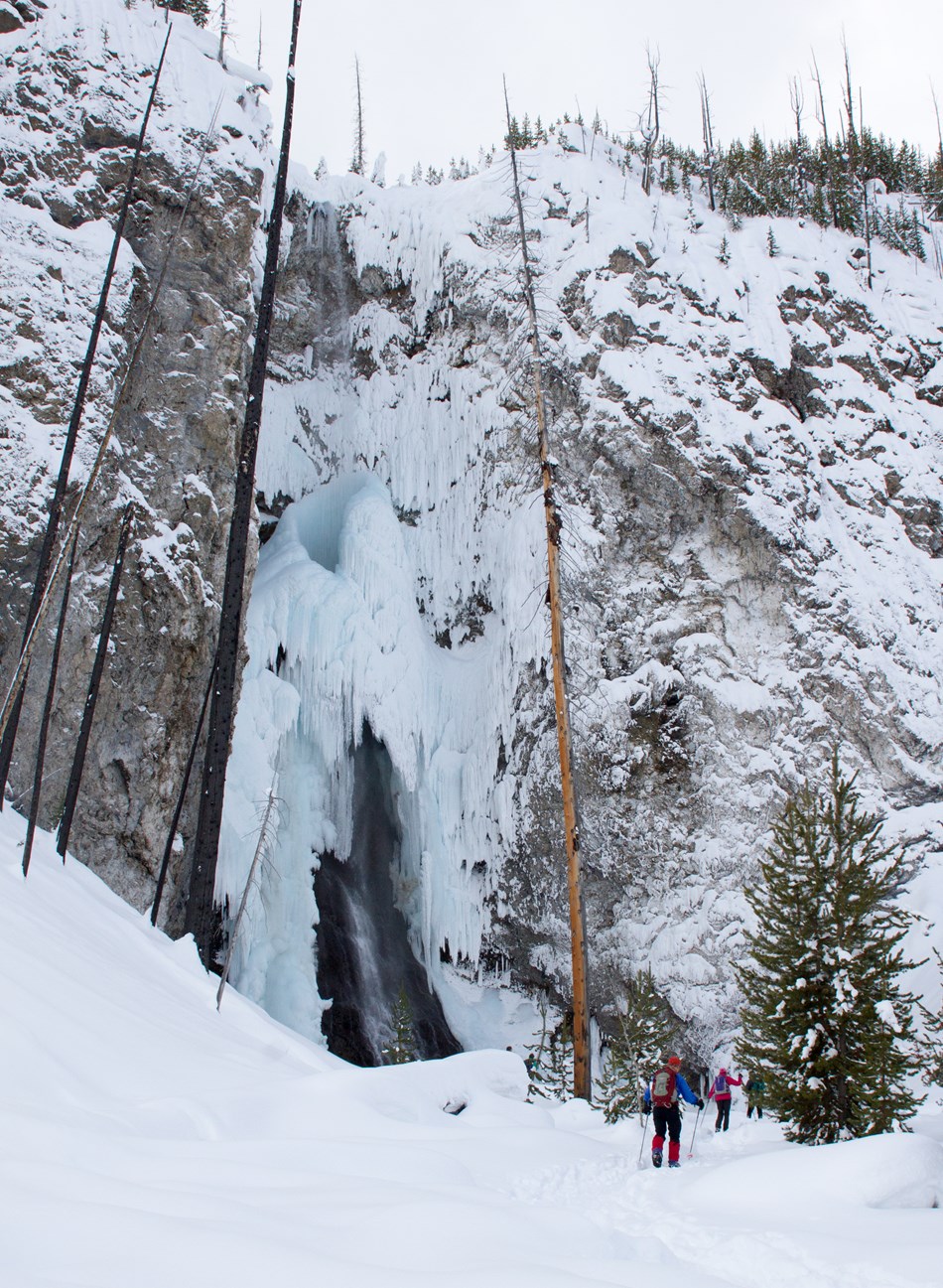 Skiers marvel at frozen Fairy Falls. Skiers marvel at frozen Fairy Falls.