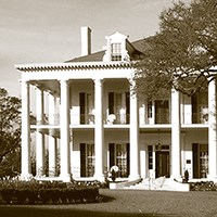 Dunlieth large two-story house with columns and first and second story porches across the front